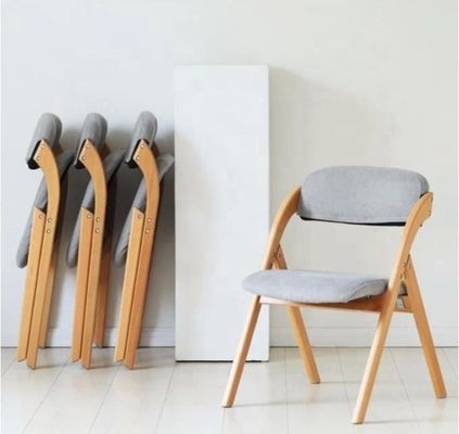 Foldable Dining Chair with Solid Wood Legs and Modern Design featuring Fabric or PU Leather Material