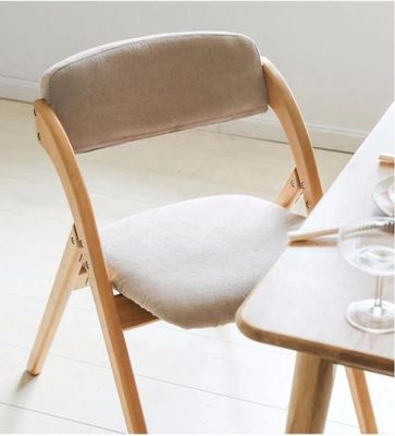 Foldable Dining Chair with Solid Wood Legs and Modern Design featuring Fabric or PU Leather Material