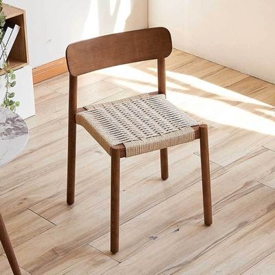 Create a Relaxing Dining Atmosphere with Nordic Light Luxury Solid Wood Dining Chair and Woven Rope Backrest