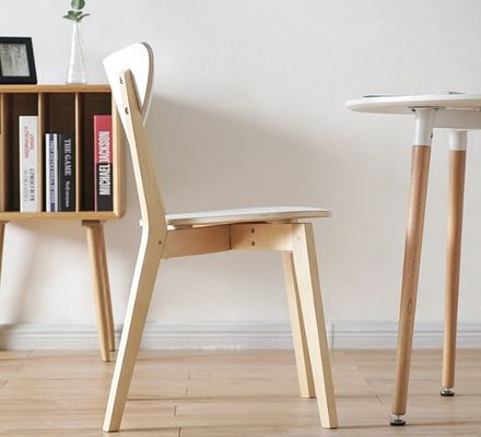Add a Touch of Sophistication to Your Dining Room with Solid Birch Wood Stacking Chairs in Modern North European Style
